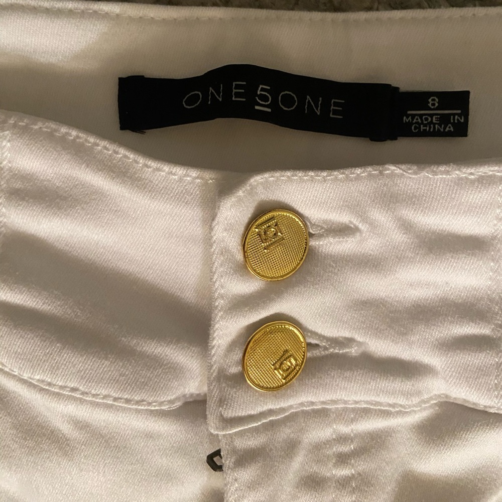 One5One white cotton straight leg pants.